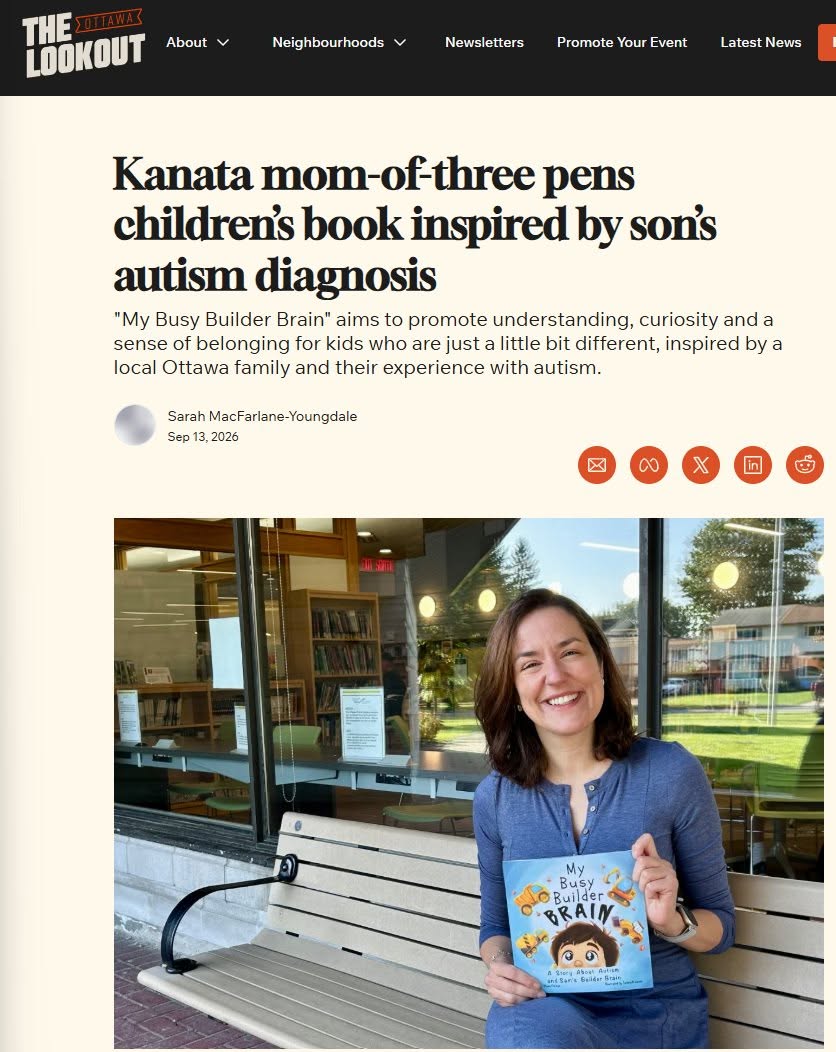 Author holding the children's book My Busy Builder Brain